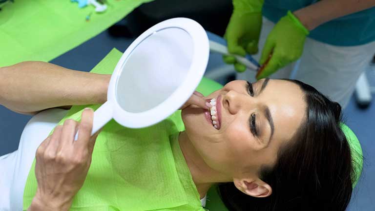 gummysmiletreatmentaestheticscompany Image of someone having gummy smile treatment at The Aesthetics Company UK