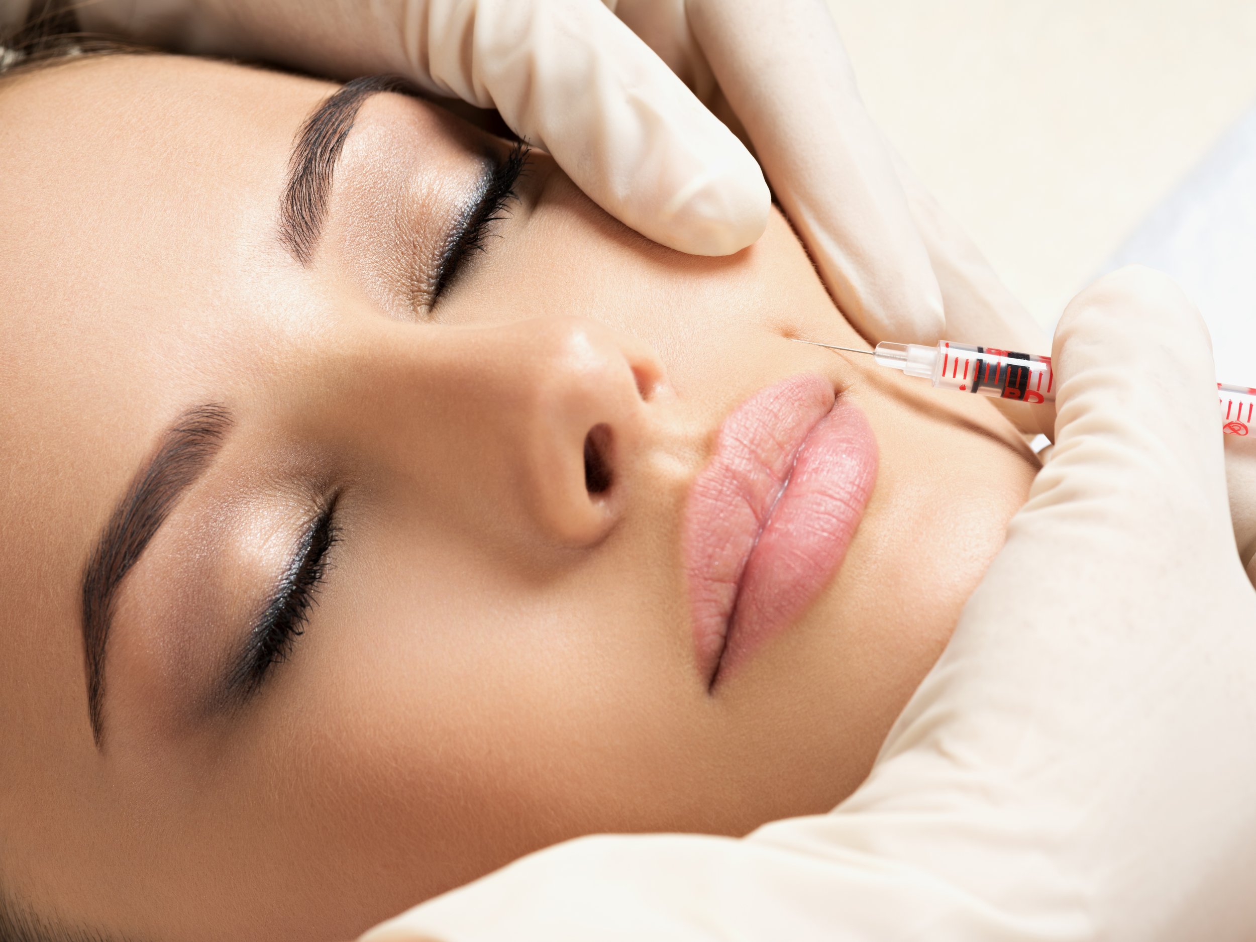 Beauty woman botox injections. Injectable skin boosters being administered at The Aesthetics Company UK